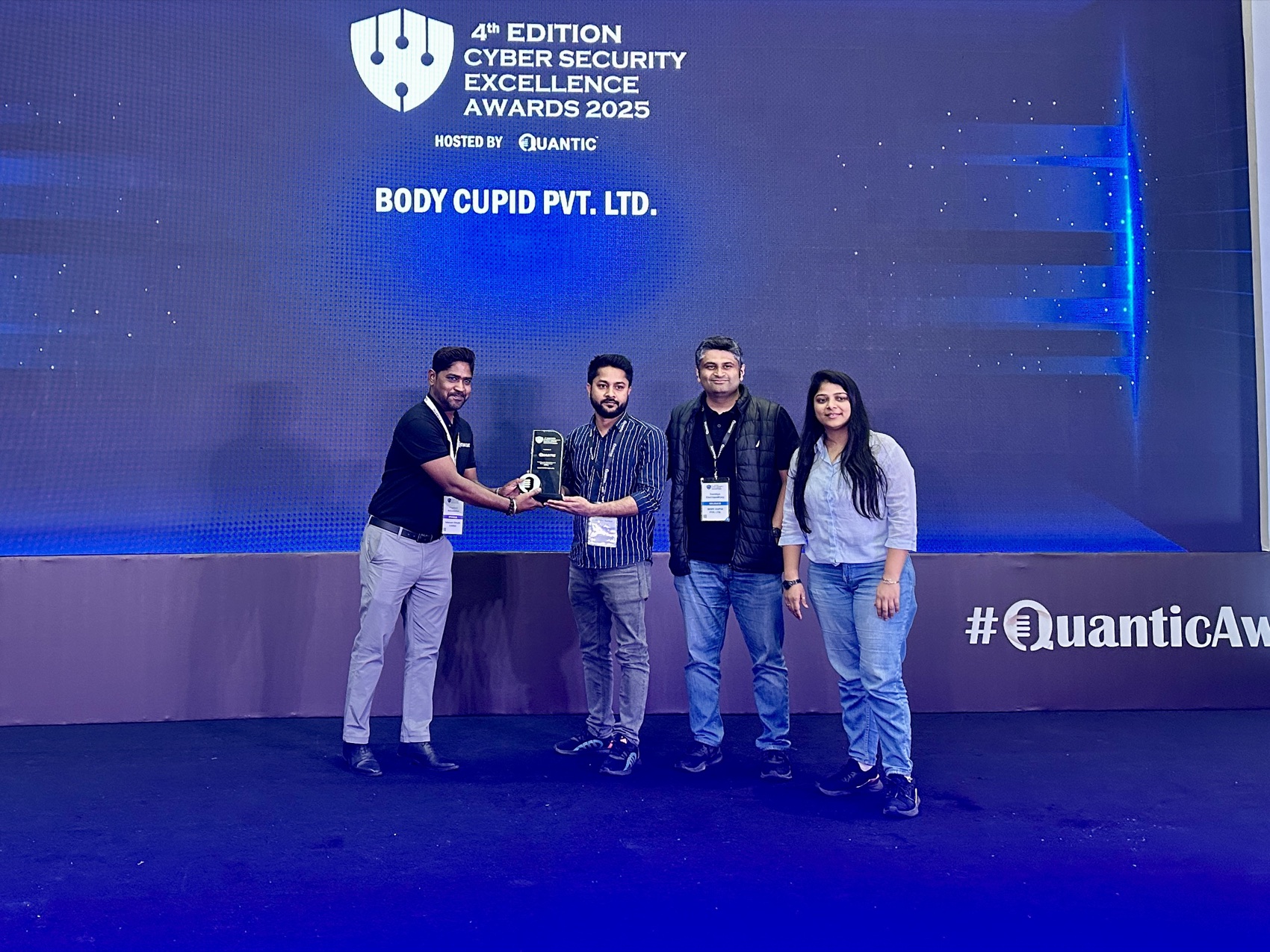 Shubh Sarkar with the team receiving the 4th Edition Cyber Security Excellence Award 2025, hosted by Quantic, on behalf of Body Cupid Pvt. Ltd.